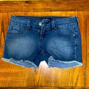 Vintage 90s low rise jean shorts.